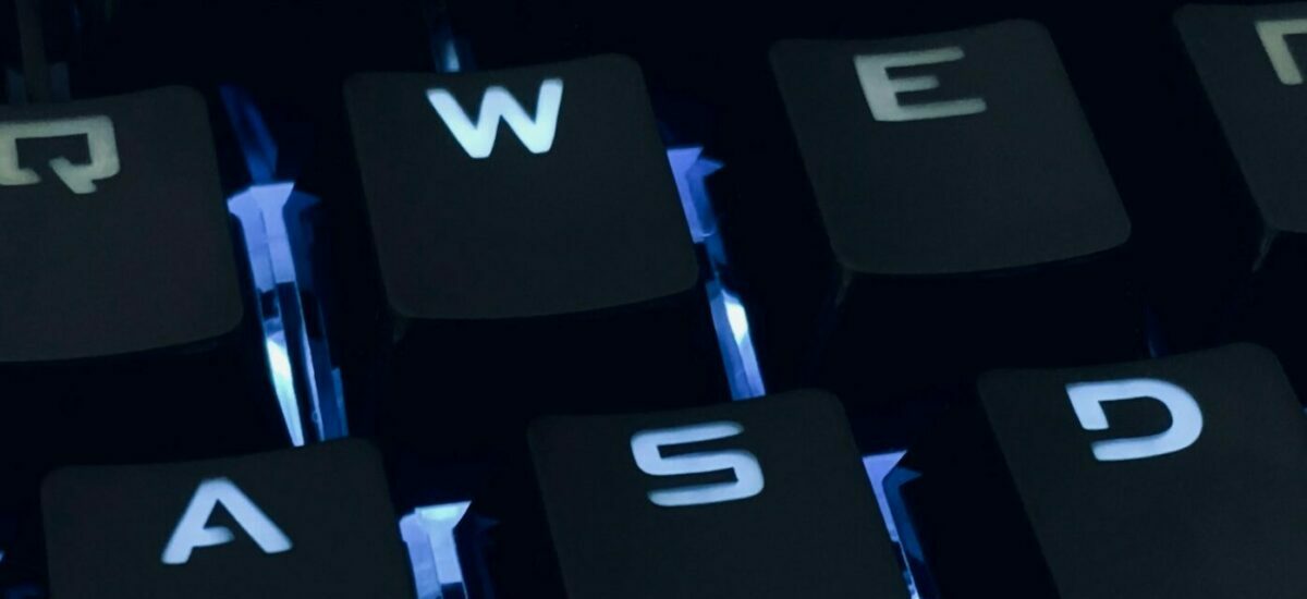 Typing in a password on a keyboard to enter for your Facebook Security